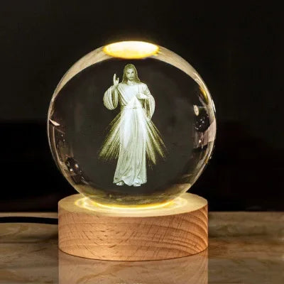 Una luz de fe en tus manos. Bola de cristal imágenes religiosas