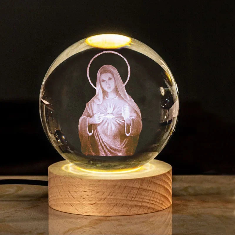 Una luz de fe en tus manos. Bola de cristal imágenes religiosas