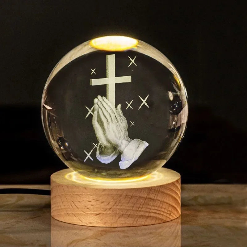 Una luz de fe en tus manos. Bola de cristal imágenes religiosas