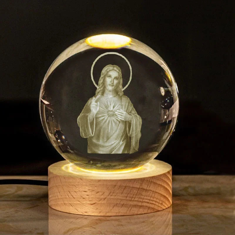 Una luz de fe en tus manos. Bola de cristal imágenes religiosas